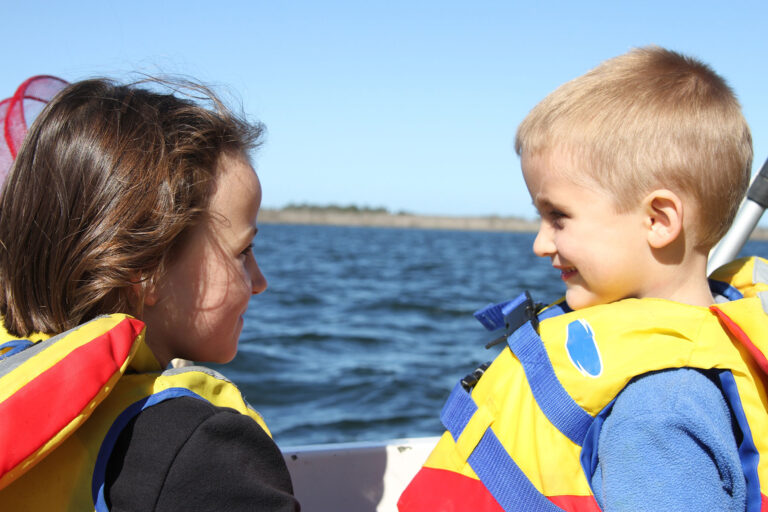 kids wearing life jackets