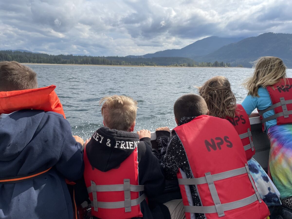 kids on a boat